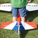 Eoin Hubbard, 8, stands over a remote control airplane at the 29th Flying Pilgrims Radio Control Club event on Sunday. Daniel Brenner I AnnArbor.com